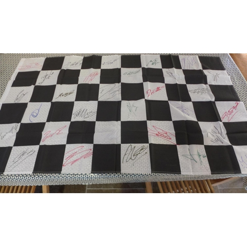 266 - Sporting Interest: Formula 1- a signed chequered flag with 30 signatures to include Damon Hill, Eddi... 