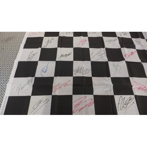 266 - Sporting Interest: Formula 1- a signed chequered flag with 30 signatures to include Damon Hill, Eddi... 