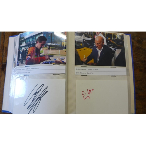 268 - A collection of 37 Formula 1 racing signatures including Sir Stirling Moss, Lewis Hamilton and Murra... 