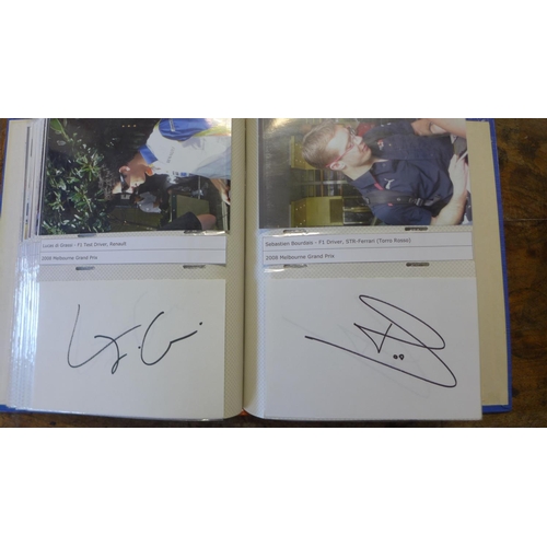 268 - A collection of 37 Formula 1 racing signatures including Sir Stirling Moss, Lewis Hamilton and Murra... 