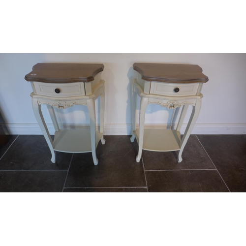4 - A pair of painted bedside tables each with a single drawer and under tier