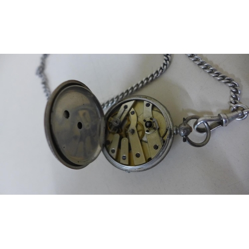 604 - A silver and gilt pocket watch and chain - approx weight 60 grams - no key but runs