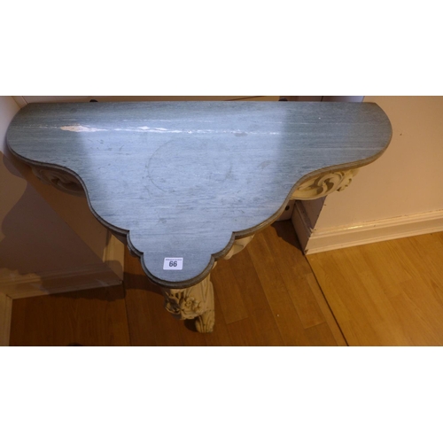 66 - A painted carved marble top pier table, 83cm tall x 94cm x 51cm, marble top good, base has been over... 