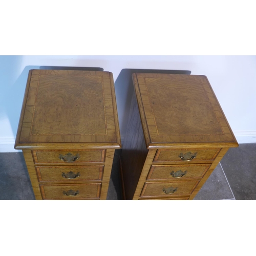 97 - A pair of burr oak four drawer bedside chests made by a local craftsman to a high standard incorpora... 