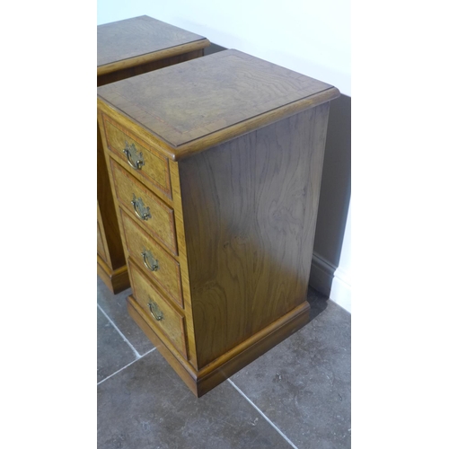 97 - A pair of burr oak four drawer bedside chests made by a local craftsman to a high standard incorpora... 