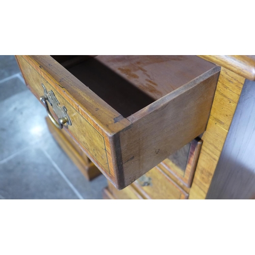 97 - A pair of burr oak four drawer bedside chests made by a local craftsman to a high standard incorpora... 