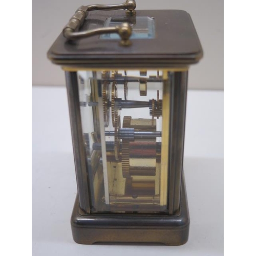 103 - An 8 day brass carriage clock by Matthew Norman of London - working order - generally good - Height ... 