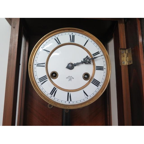 105 - A Vienna style 8 day wall clock, strikes hours and half hours - Height 83cm - running