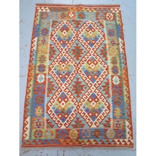 134 - A hand knotted woollen Chobi Kilim rug - 153cm x 101cm