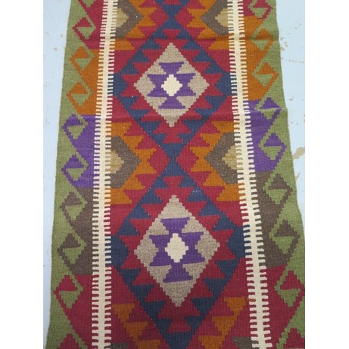 135 - A hand knotted woollen Maimana Kilim runner - 192cm x 60cm