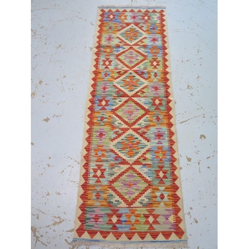 136 - A hand knotted woollen Chobi Kilim runner - 192cm x 62cm