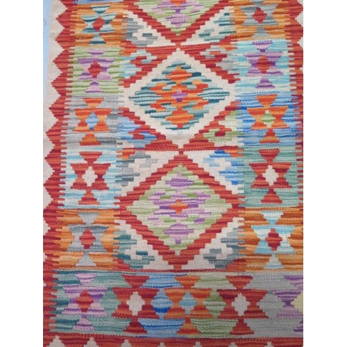 136 - A hand knotted woollen Chobi Kilim runner - 192cm x 62cm