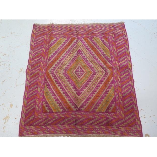 137 - A hand knotted woollen Gazak rug - 120cm x 110cm