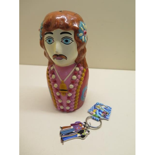242 - An unusual Japanese Ringo Starr money box - damaged with 2006 key ring
