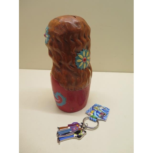 242 - An unusual Japanese Ringo Starr money box - damaged with 2006 key ring