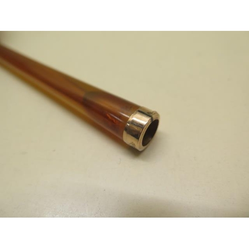 246 - A long ladies cigarette holder with a hallmarked 9ct yellow gold band - length 14cm - with original ... 