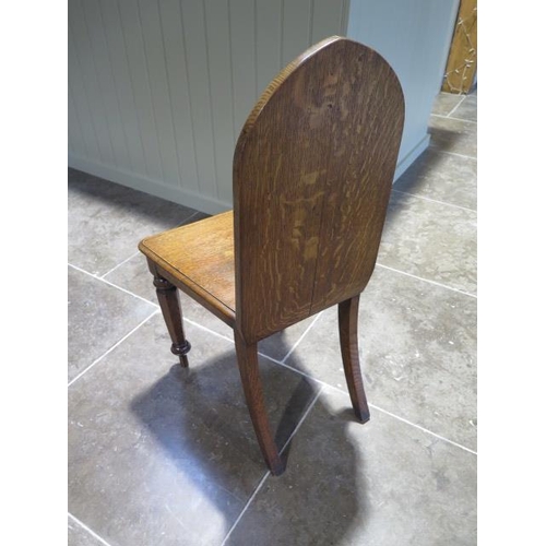 50 - A 19th century Gothic style hall chair in polished condition - Height 50cm