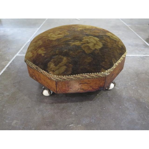 51 - An early Victorian foot stool with ball and claw feet - some wear to fabric, wood in polished condit... 