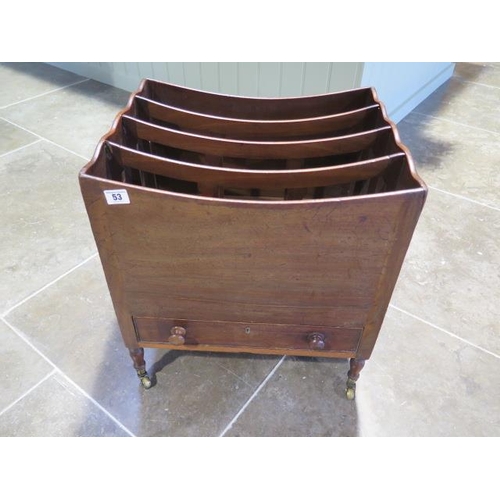 53 - A 19th century mahogany Canterbury on turned legs and brass casters with bottom drawer - Height 50cm... 