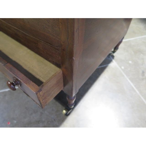 53 - A 19th century mahogany Canterbury on turned legs and brass casters with bottom drawer - Height 50cm... 