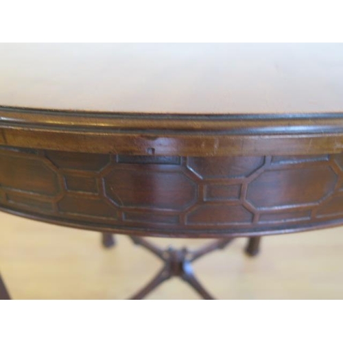 62 - An Edwardian mahogany circular window table with a blind fretwork frieze and fretwork stretchers - 7... 