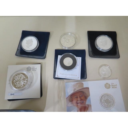 692 - Two fine silver £20 90th Birthday Elizabeth II coins in packets - St George and Dragon silver £1 coi... 