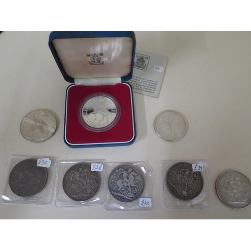 695 - Five Victorian silver crowns 1891, 1893, two 1889 and 1890 an 1884 silver American dollar, a silver ... 