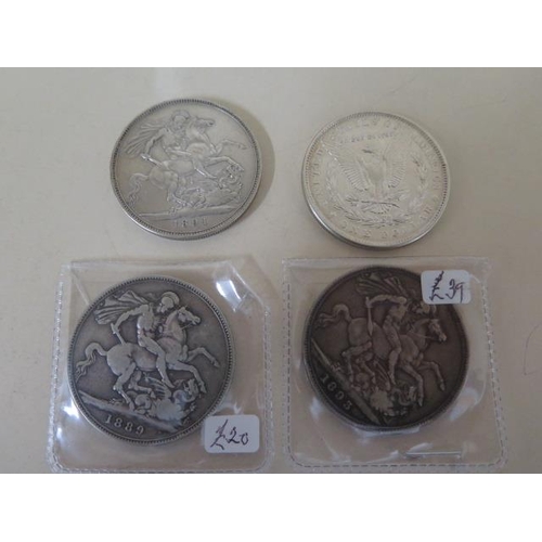 695 - Five Victorian silver crowns 1891, 1893, two 1889 and 1890 an 1884 silver American dollar, a silver ... 