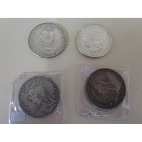 695 - Five Victorian silver crowns 1891, 1893, two 1889 and 1890 an 1884 silver American dollar, a silver ... 