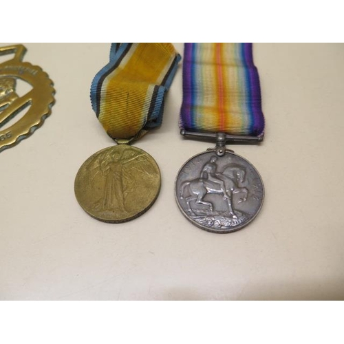 727 - Two WWI medals to T-4449 Pte SW Holloway The Queens R, three unnamed WWII medals and a Churchill bra... 