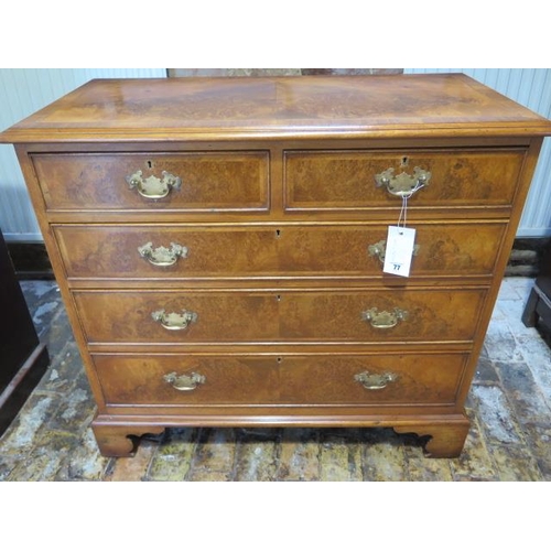 77 - A walnut veneered Georgian style chest with two small over three long drawers - in good clean condit... 