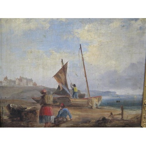181 - An 18th/19th century oil on oak panel coastal scene with figures and boat to the foreground in a gil... 