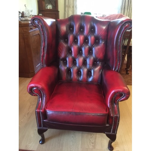 29 - A  leather wing back armchair Height 42 in 
Wing widest width 34 in
Seat height 17 in