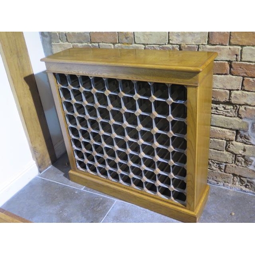 28 - A burr oak 72 bottle wine rack made by a local craftsman to a high standard - Height 96cm x 99cm x 2... 