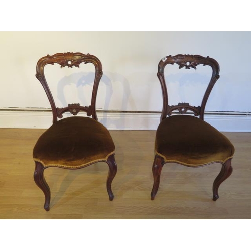 71 - A nice pair of 19th century rosewood side chairs with upholstered seats on cabriole legs