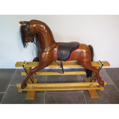 1001 - A good quality wooden rocking horse made by White Horses, The Old Exchange, Mill Lane, Welwyn, Herts