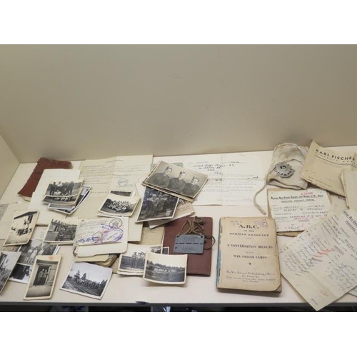 1023 - An interesting collection of WWII ephemera to Pte A G Phypers 5955827 including paperwork and photog... 