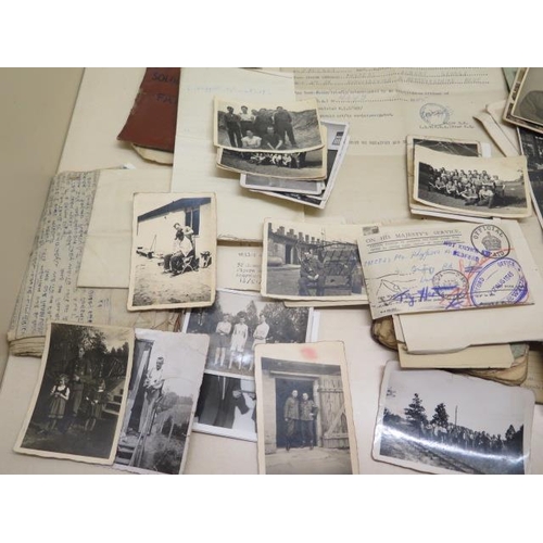 1023 - An interesting collection of WWII ephemera to Pte A G Phypers 5955827 including paperwork and photog... 