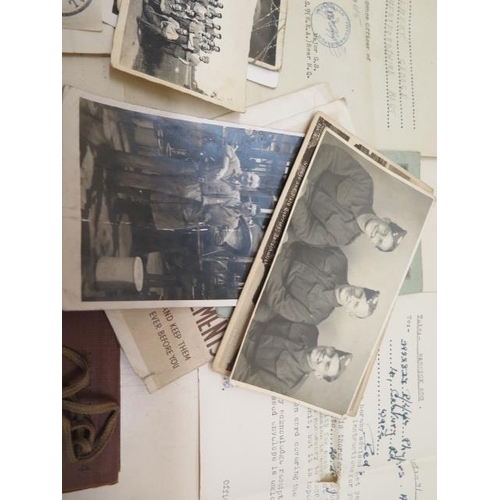 1023 - An interesting collection of WWII ephemera to Pte A G Phypers 5955827 including paperwork and photog... 