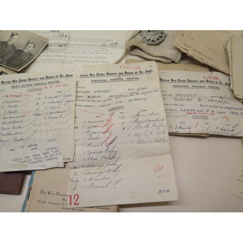 1023 - An interesting collection of WWII ephemera to Pte A G Phypers 5955827 including paperwork and photog... 