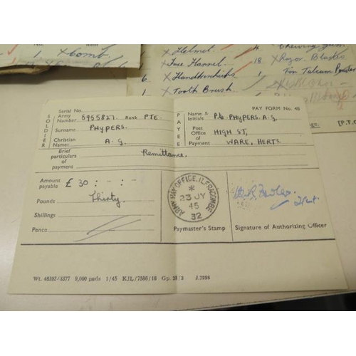 1023 - An interesting collection of WWII ephemera to Pte A G Phypers 5955827 including paperwork and photog... 