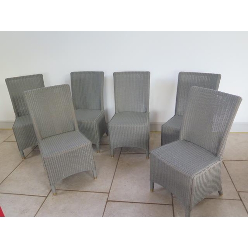 12 - A set of six Lloyd Loom grey dining chairs  - in good condition - retail around £1200