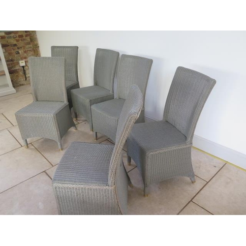 12 - A set of six Lloyd Loom grey dining chairs  - in good condition - retail around £1200