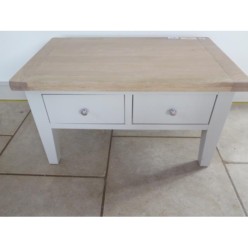 17 - An ex display chalked oak coffee table - width 90cm - as new, retails at £185