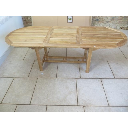 20A - A new Oliver Heartwood Taha single leaf extending hard wood garden table 75cm tall, extends from 180... 