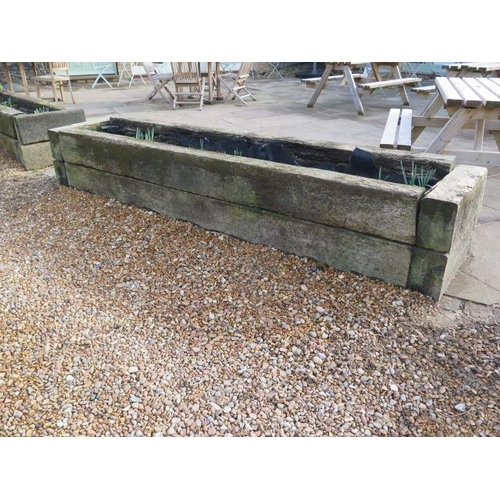 23 - An oak planter made from reclaimed railway sleepers - dismantled for ease of transport - length 300c... 