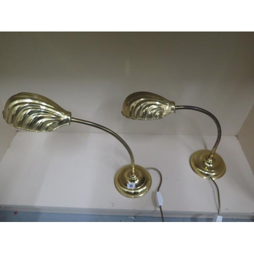 25 - A pair of brass adjustable desk lamps - both working