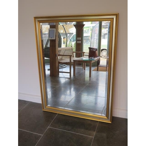 4 - A large gilt and silvered frame mirror - 134cm x 103cm