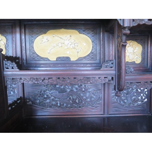 41 - A carved Japanese Shibayama cabinet with a series of sliding doors, drawers and cupboard doors - Hei... 