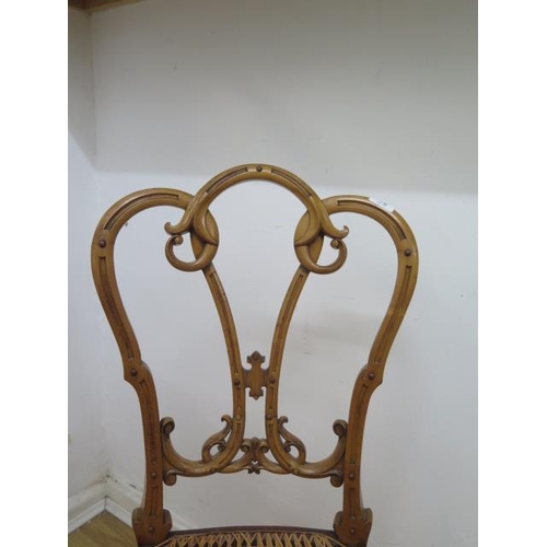 45 - A pretty Victorian satinwood side chair with a cane seat - in sound condition